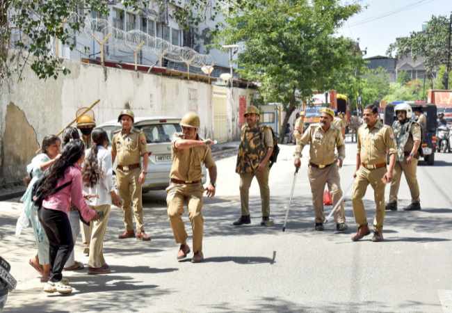 Noida workers' protest turns violent; govt steps in, political blame game erupts